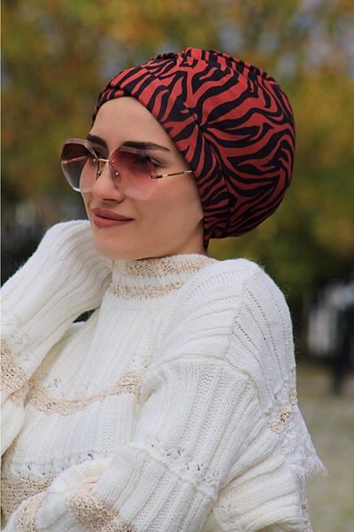 tessetür Bone diyarı غطاء رأس متقاطع بنمط الفهد الأحمر