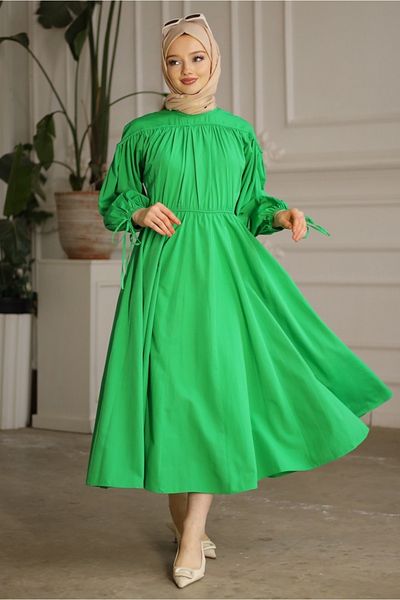 Gizce Leong Green Dress