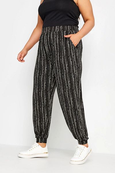 Stil Diva Pantaloni subțiri de mărime mare, cu buzunare, cu picioare și talie elastică 302587