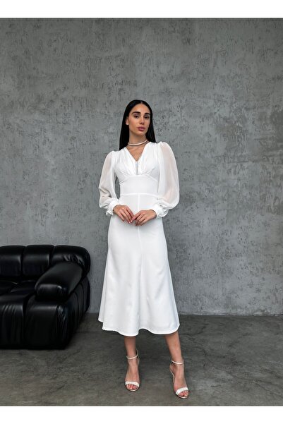 Elizar Moda فستان أبيض برقبة على شكل حرف V مزين بالأحجار