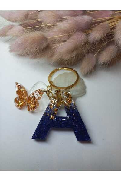 demirbasavm سلسلة مفاتيح مصنوعة يدويًا من الإيبوكسي