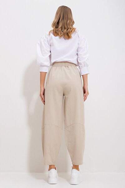 Trend Alaçatı Stili Kadın Bej Beli Lastikli Çift Cepli Dizleri Dikiş Detaylı Şalvar Kesim Gabardin Pantolon ALC-X11885