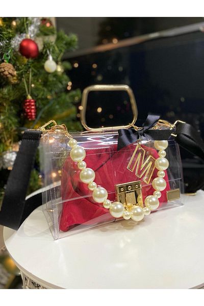 AREV BAGS حقيبة حمراء شفافة مع حزام اللؤلؤ