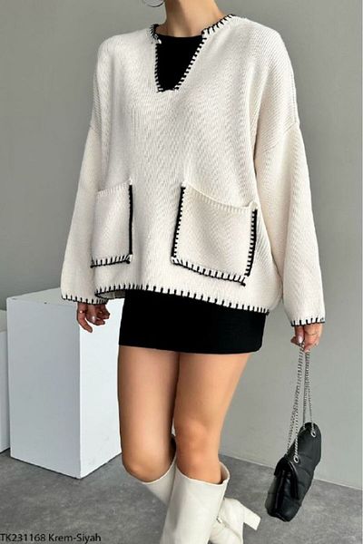 Laluvia Creme-schwarzer Pullover mit Paspelierung und Taschendetail