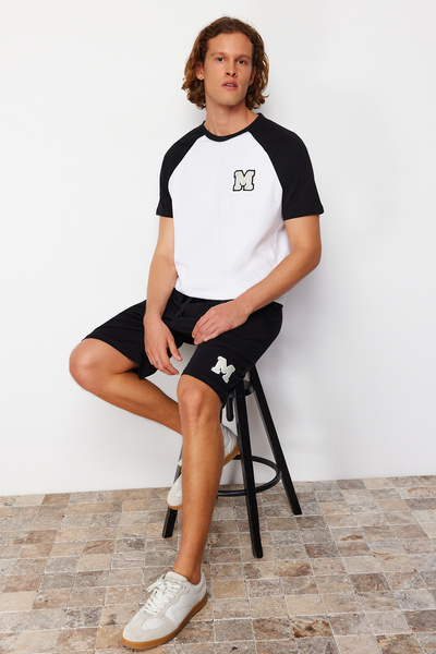 Trendyol Collection Black and White Embroidered Raglan Sleeve Knitted Shorts Pajamas Set TMNSS24PT00007