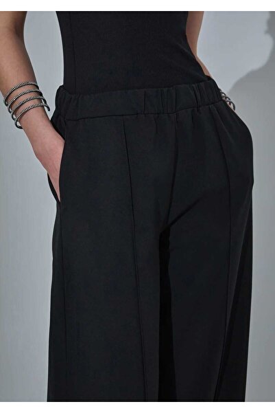 Quzu Paçası Mini Yırtmaçlı Pantolon