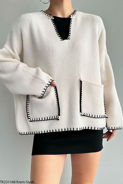 Laluvia Creme-schwarzer Pullover mit Paspelierung und Taschendetail