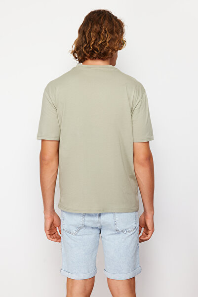 Trendyol Collection Nadměrné bavlněné tričko MinT s potiskem - TMNSS23TS00261