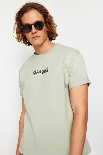 Trendyol Collection Menta puffadt szövegű széles szabású pamut póló - TMNSS24TS00117