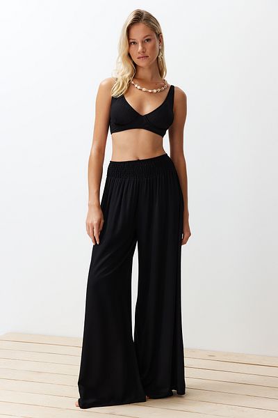 Trendyol Collection Schwarze, gewebte Strandhose mit Gips-Details TBESS24PL00008
