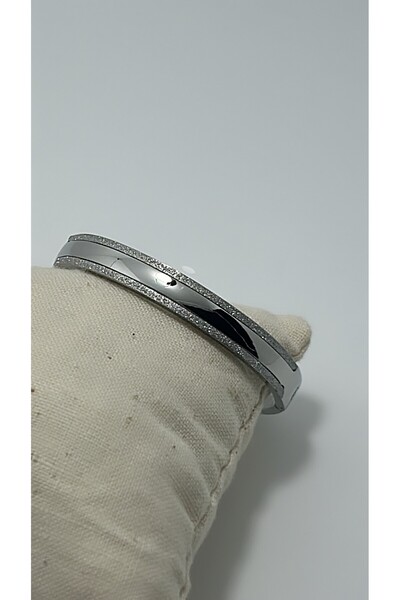 By Semra PASLANMAZ ÇELİK BEBE BOY GOLD SİMLİ GÜMÜŞ RENK KELEPÇE