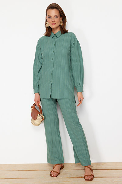 Trendyol Modest Hellblaues gewebtes Hemd-Hosen-Set mit langem Rücken und weitem Bein TCTSS22US0030