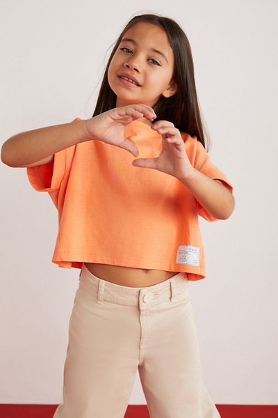 GRIMELANGE Pomarańczowy T-shirt dziewczęcy Verena, wykonany w 100% z bawełny, z podwójnym rękawem i ozdobną metką