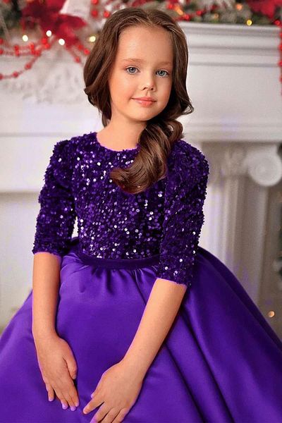 Riccotarz Girl's Shimmering Sequin Embroidered Waist Ribbon and Bow Detail Purple Dress