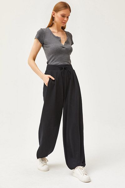 Olalook Schwarze, weich strukturierte, fließende Baggy-Hose mit Schnürung für Damen PNT-19000273