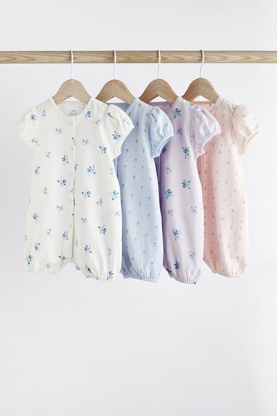 Next Baby طقم رومبير مزين بالزهور باللون الأبيض والأزرق والوردي مكون من 4 قطع - 100% قطن