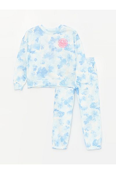 LC Waikiki Gemustertes Langarm-Sweatshirt und Jogginghose für Mädchen mit Rundhalsausschnitt