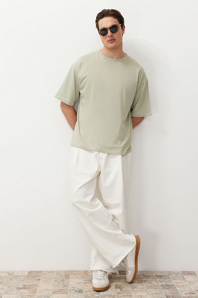 Trendyol Collection Mintfarbenes, übergroßes Baumwoll-T-Shirt mit Blumendruck – TMNSS21TS1223