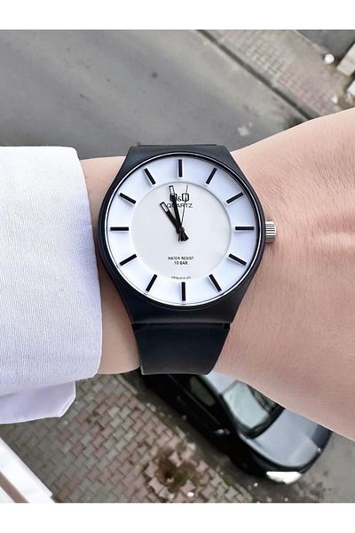 Q&Q  Women's Waterproof Plastic Cord Wristwatch