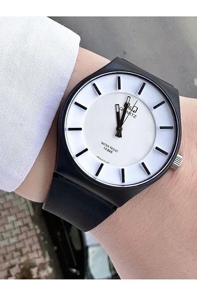 Q&Q  Women's Waterproof Plastic Cord Wristwatch