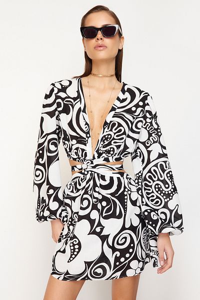 Trendyol Collection Пляжна сукня з квітковим візерунком з міні-тканого полотна з вирізом-вікном TBESS23EL00140