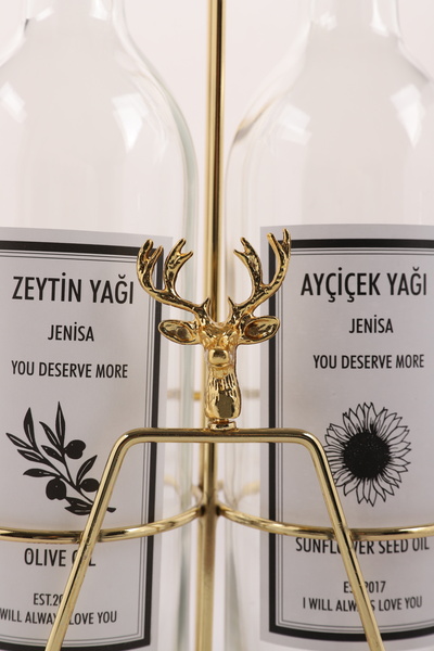 Jenisa Transparent Bottle Oil Pot with Gold Color Deer Accessory and Gold Stand Deer Cork Stopper