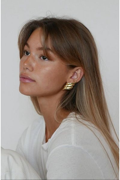 takıtarzım Gold women's twist earrings