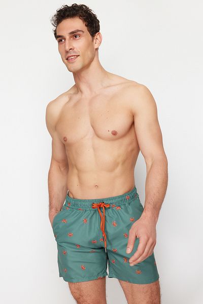 Trendyol Collection Grüne gemusterte Seeshorts mit Standardpassform - TMNSS24DS00006