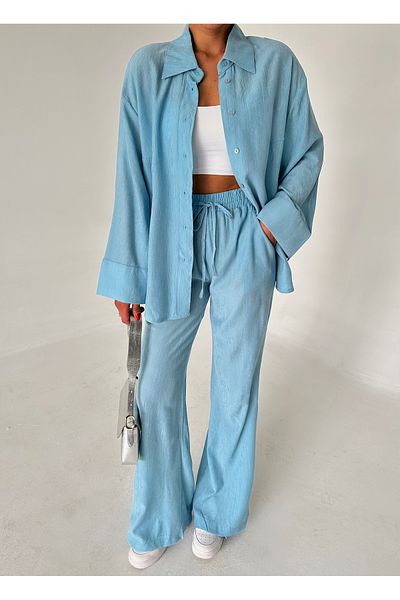 Laluvia Блакитний фактурний брючний костюм Гомлеклі з текстурою Baby Blue