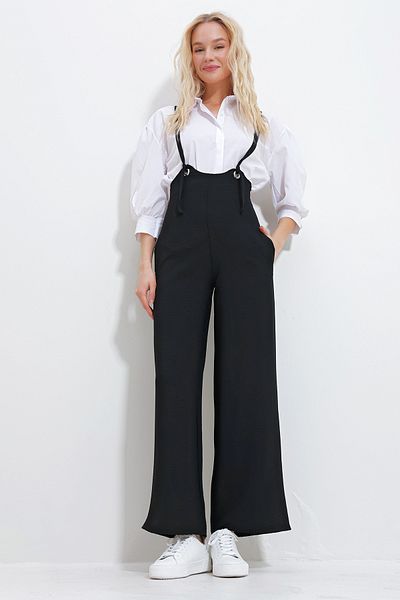 Trend Alaçatı Stili Schwarze Damen-Salopet mit verstellbarem Riemen und verstecktem Reißverschluss und doppelter Tasche ALC-X11979