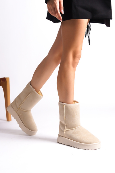 Capone Outfitters Γυναικείες μπότες επίπεδη σόλα μεσαίου μεγέθους μπεζ με γούνα εσωτερικά