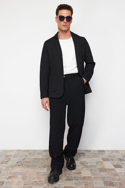 Trendyol Collection Schwarze Slim-Fit-Blazerjacke mit zwei Taschen TMNAW23CE00014