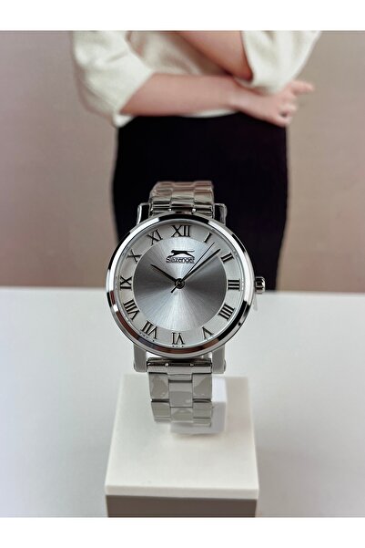 Slazenger ساعة يد نسائية من الفولاذ بأرقام رومانية مقاومة للماء ضمان لمدة عامين