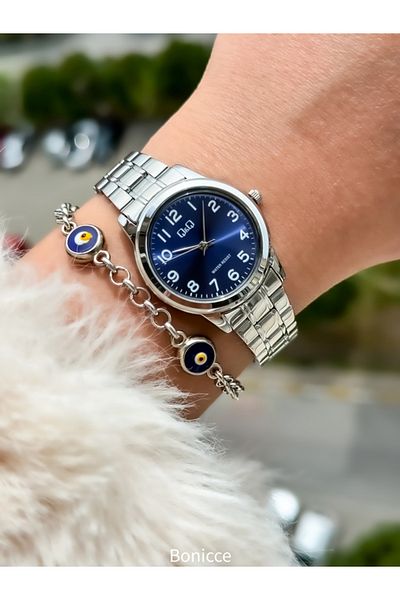 Q&Q Navy Blue Numeral Dial Steel Cord, Waterproof, Stylish Women's Wristwatch Evil Eye Beaded Bracelet