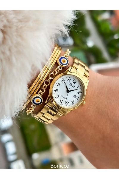 Q&Q Steel Cord Waterproof Gold Color Women's Wristwatch Bracelet with Calendar