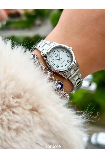 Q&Q Silver Colored Small Case - Steel Cord Evil Eye Beaded Bracelet Wristwatch