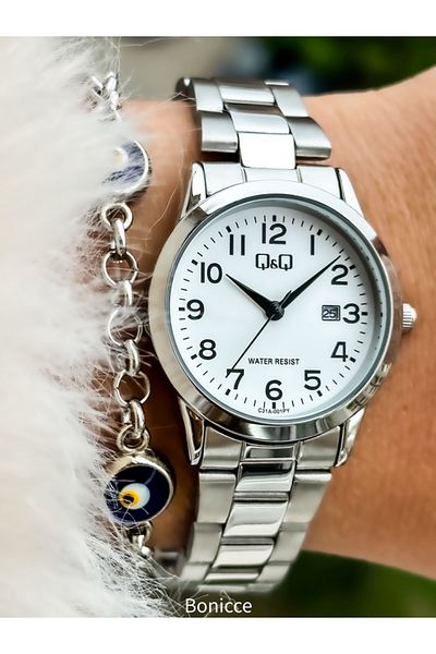 Q&Q Silver Colored Steel Cord with Calendar Women's Wristwatch Bracelet