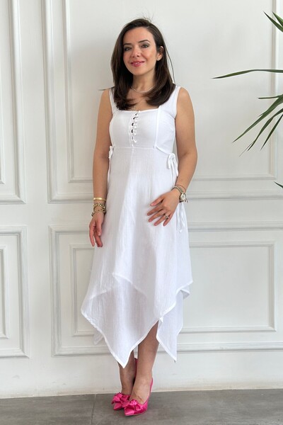 Yağmur Butik Ασύμμετρο φόρεμα με αμάνικη κοπή και λεπτομέρεια με κουμπιά