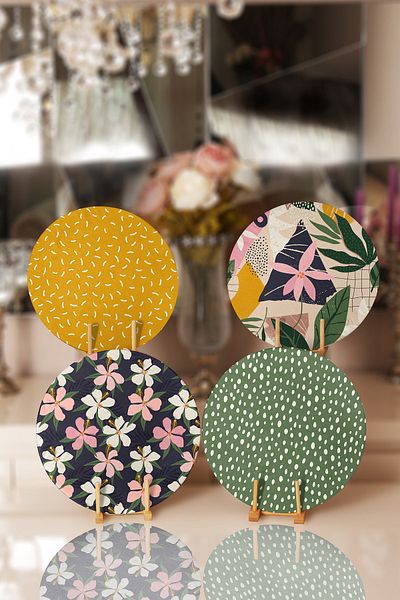 Realhomes 4-Piece Colorful Leaf Patterned Modern Placemat & Plate on the Floor