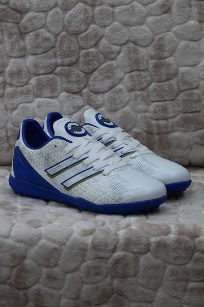 Kinetix Pantofi de fotbal pentru băieți Skill TF J White Blue Turf Astroturf