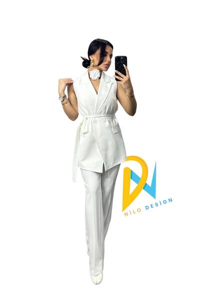 NILOO Suit: Belted, Buttoned vest, high waisted wide leg pants.