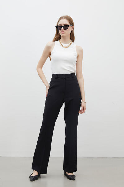 Manuka Kalhoty černého střihu Flare