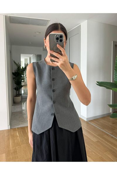 My Blog Cotton Vest with Buttons on the Front, Sitting on the Grey Waist