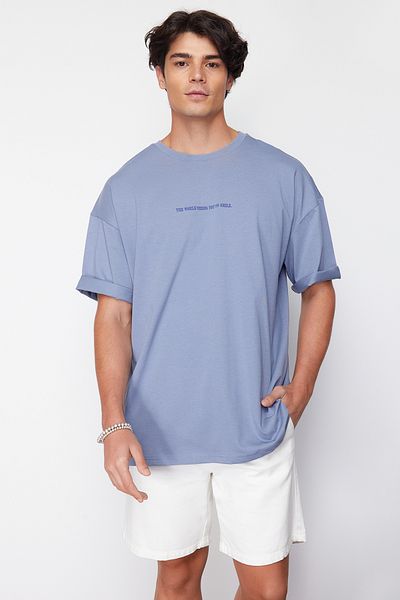 Trendyol Collection Blaues Oversize-T-Shirt mit Inschrift „Cushioned 100 % Melon“ TMNSS23TS00190