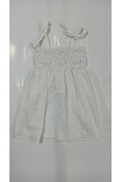 Cemix Chiffon children's dress with knitted detail on the chest.