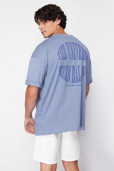 Trendyol Collection Blaues Oversize-T-Shirt mit Inschrift „Cushioned 100 % Melon“ TMNSS23TS00190