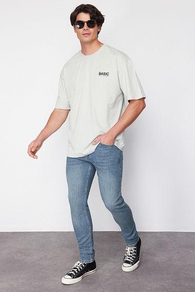 Trendyol Collection Μεσαίο μπλε ελαστικό ύφασμα Skinny Fit Slim τζιν παντελόνι TMNAW23JE00047
