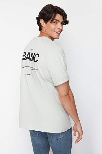 Kolekcia Trendyol Sivé oversize/široký strih s výstrihom na chrbte s potlačou 100% bavlna pletené tričko TMNSS23TS00263