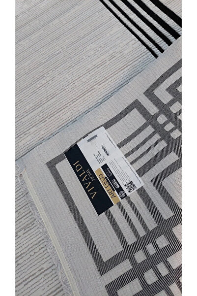 Vivaldi Polyester İplik kullanılarak,üretilen modern desenli makine halısı