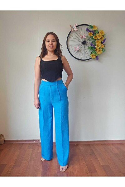 MADAME MELEK Ayrobin Лляні брюки з високою талією, застібкою на липучці та плісированими штанинами, сині